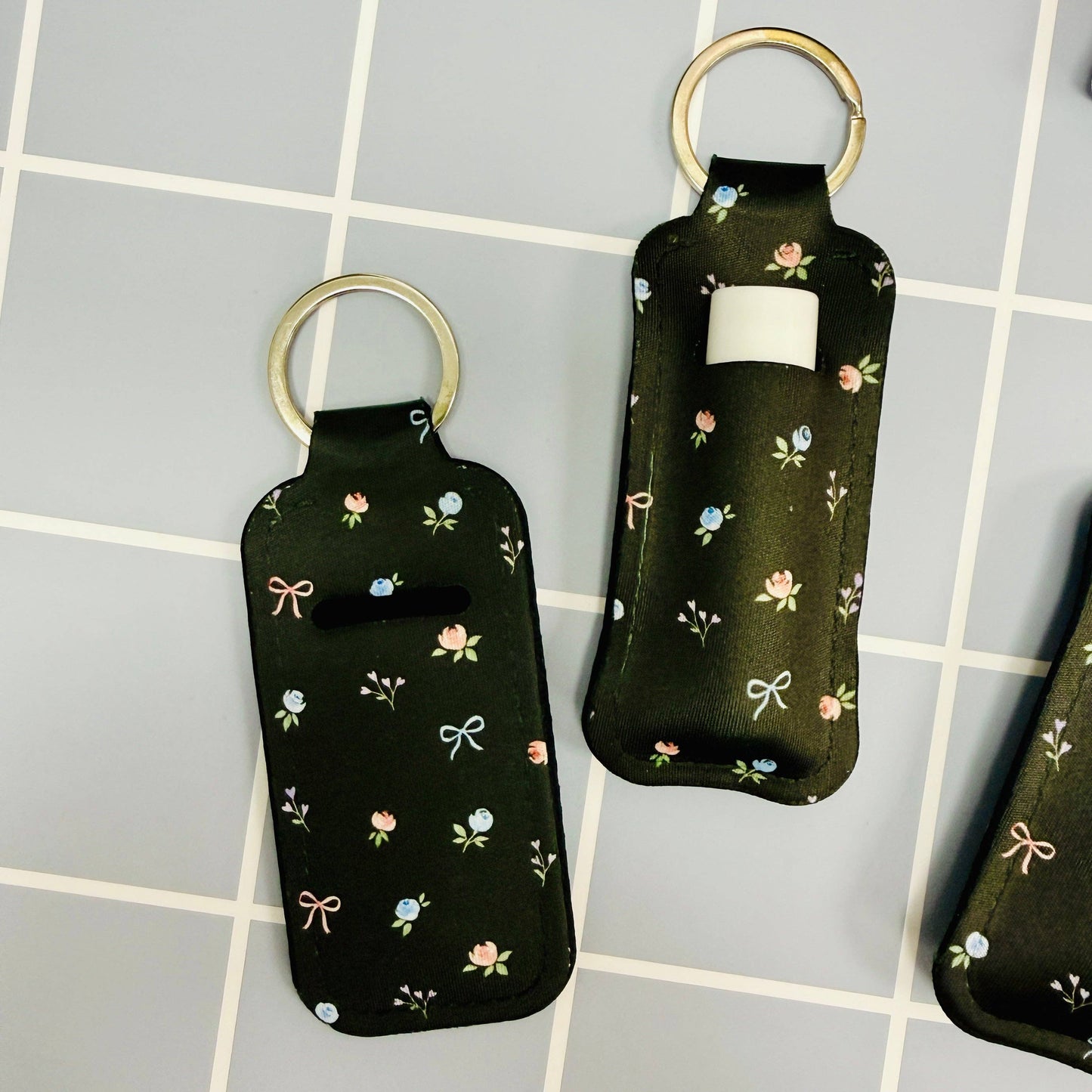 Chapstick Holder Keychain, Black Ditsy Floral and Bows Pattern