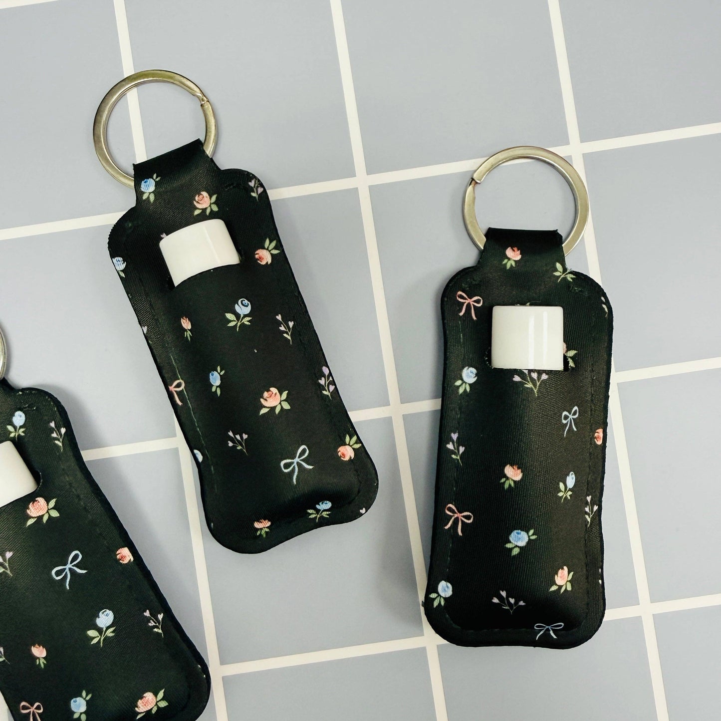 Chapstick Holder Keychain, Black Ditsy Floral and Bows Pattern